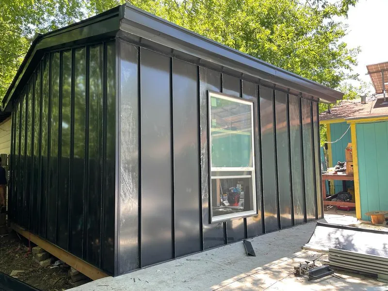 Black standing seam metal wall panels for Metal Roof Installation in Niagara Falls