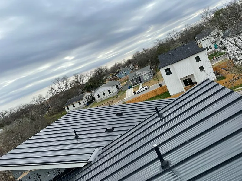 Standing seam metal roof panels with vents for Skylight Repair in Niagara Falls